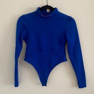 The Giving Movement Long Sleeve Royal Blue Softskin Bodysuit size Medium